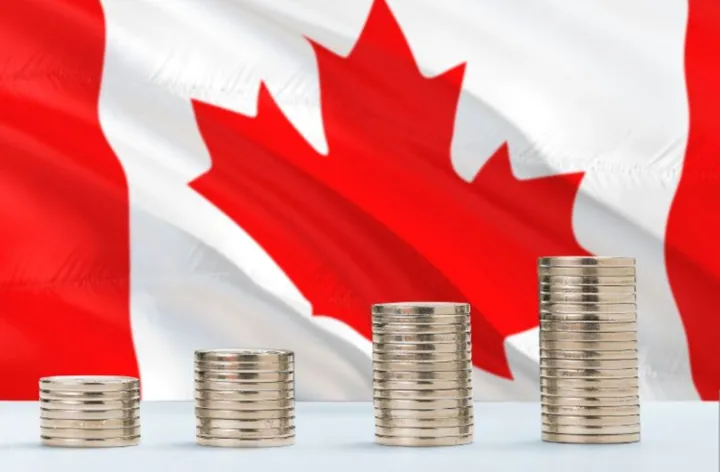پیش‌بینی نشنال بانک: دلار کانادا به‌زودی به زیر ۷۰ سنت آمریکا خواهد رسید